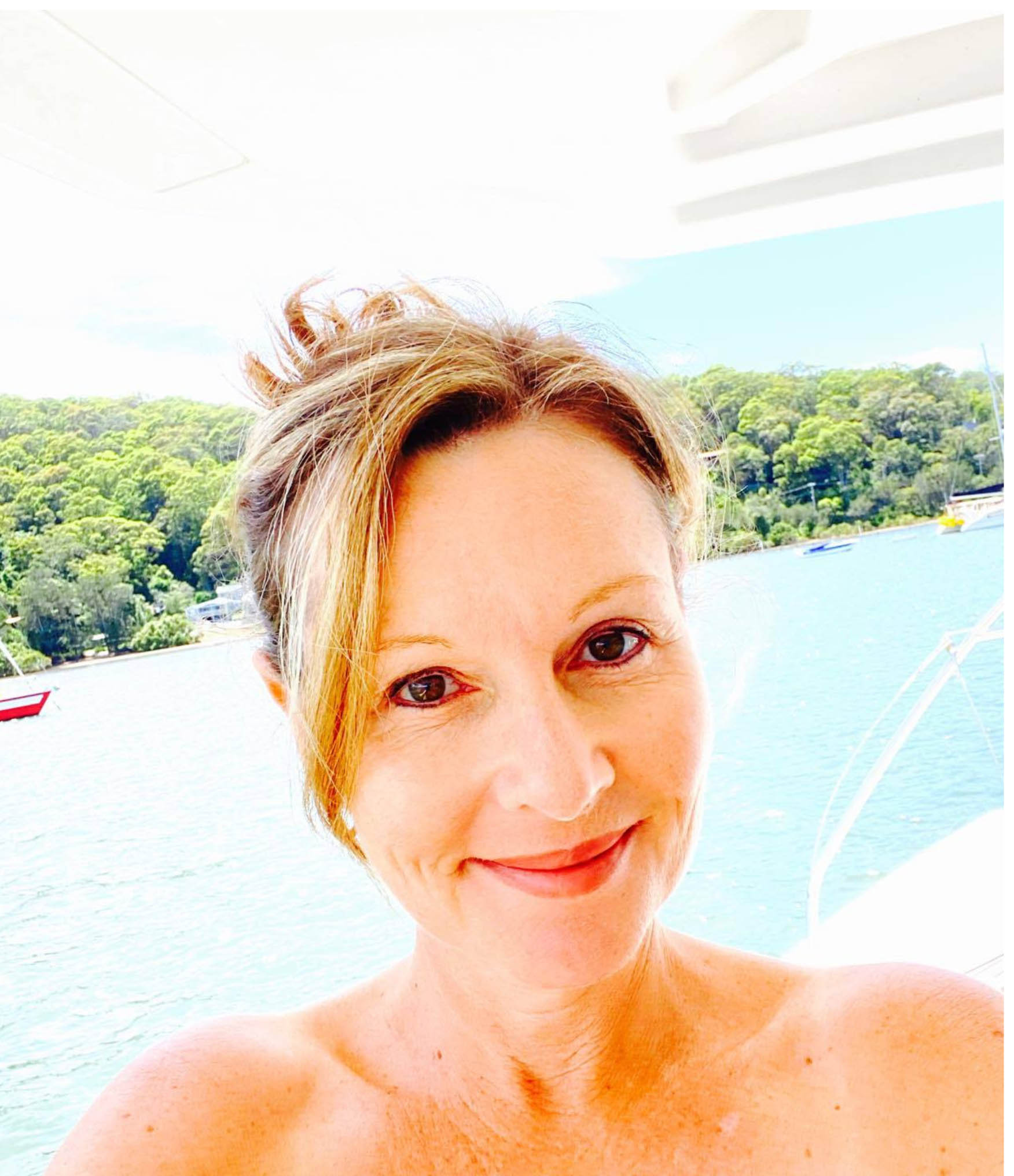 Julie Carlyle Profile Picture with a water background